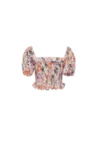 Back view of a floral print puff sleeve top