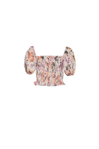 Front view of a floral print puff sleeve top