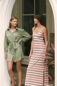 Two women wearing mini full sleeve dress and a birkin stripe maxi dress